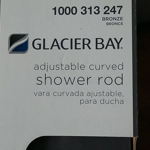 Adjustable curved shower rod